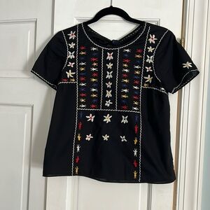Madewell embroidered top. Small. Tie back at neck. Elastic at back